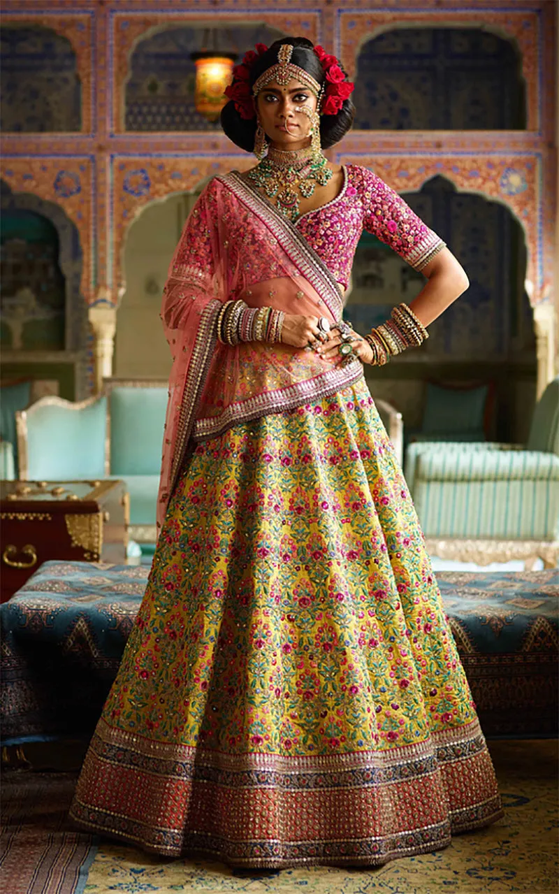 Flamboyant Yellow-Pink Colored Bridal wear Embroidered Lehenga Choli