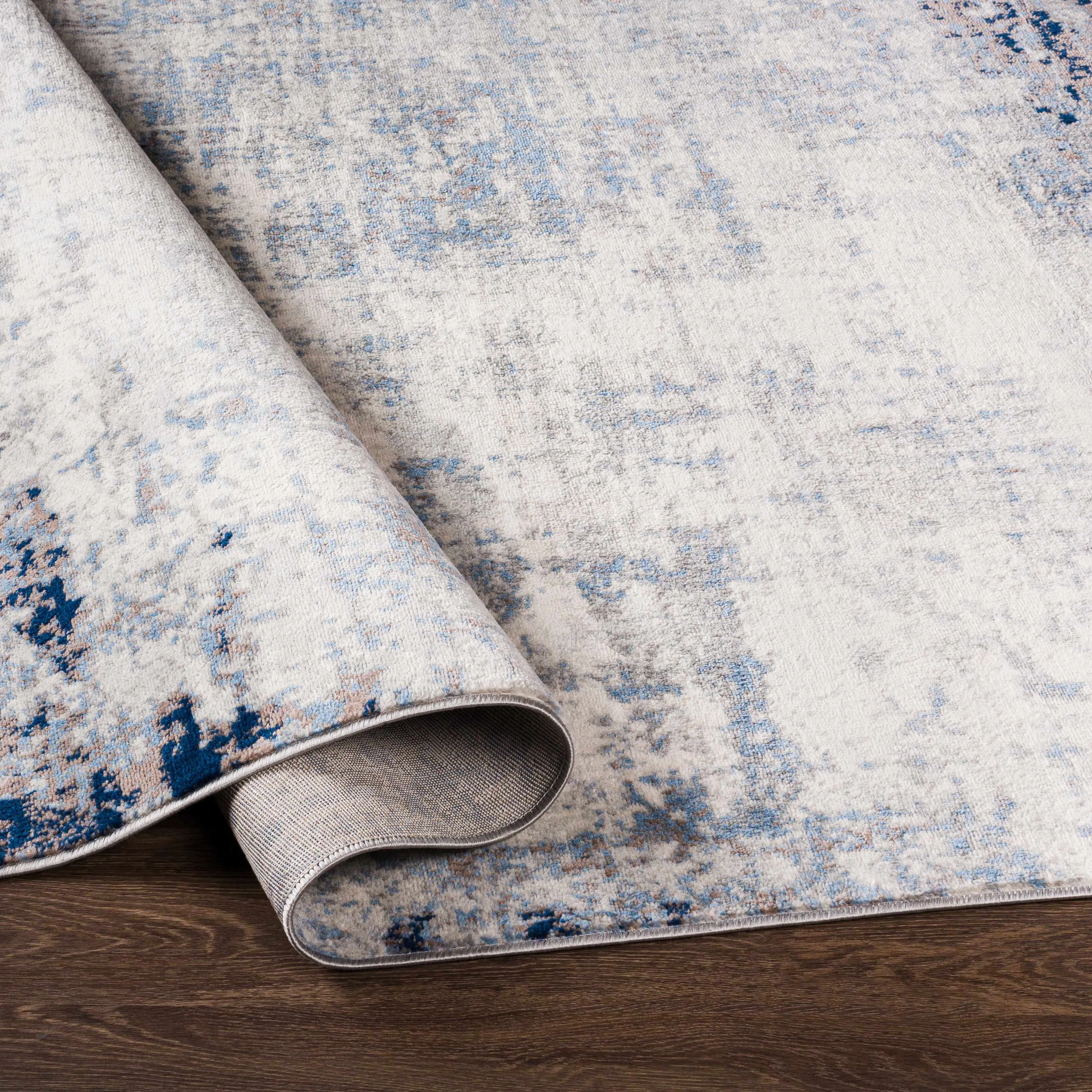 Texanna Abstract Blue/Gray Area Rug